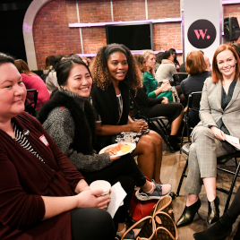 Women sitting in a circle talking