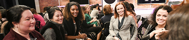 Women sitting in a circle talking