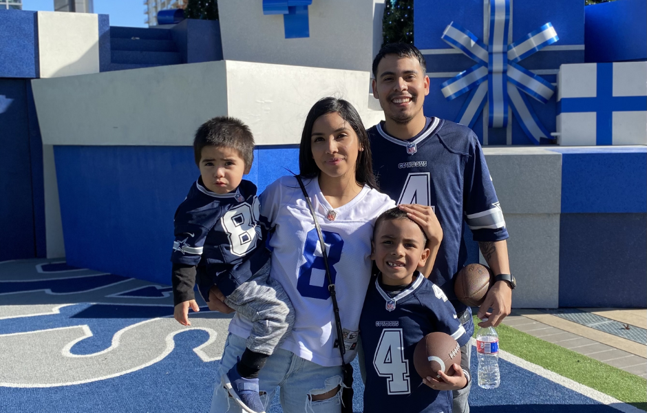Josue and his family wearing Dallas Cowboys jerseys