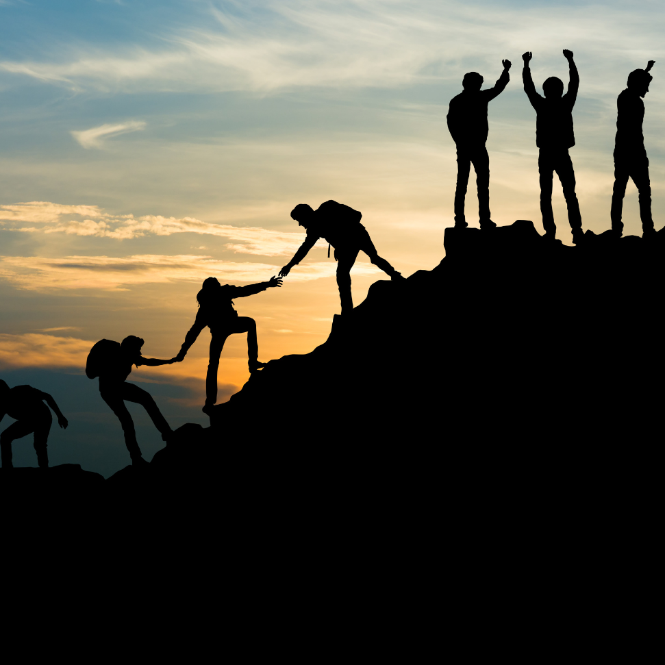 team climbing together