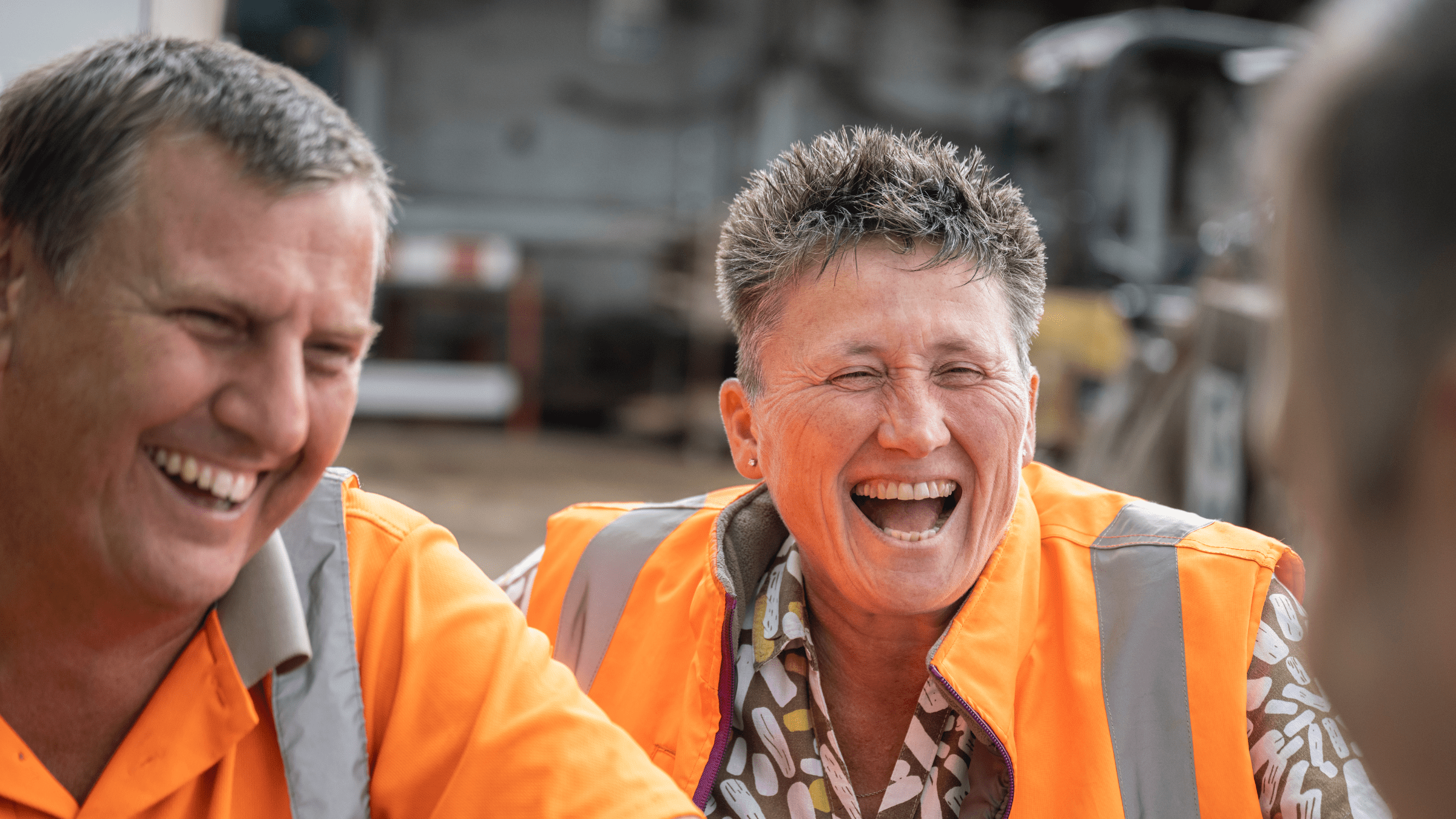 Baxter employees sharing a joyful moment