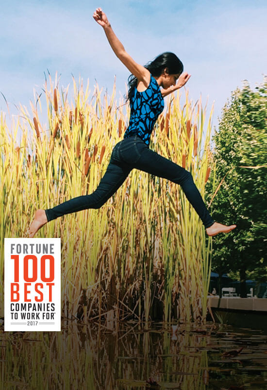 Woman jumps through the air.