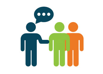Person talking with two coworkers