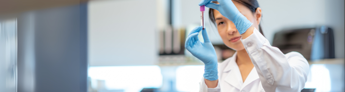 A woman holding a BD Vacutainer® Blood Collection Tube