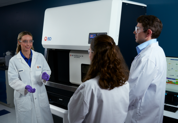 Three scientists with a BD FACSDiscover™ S8 Cell Sorter