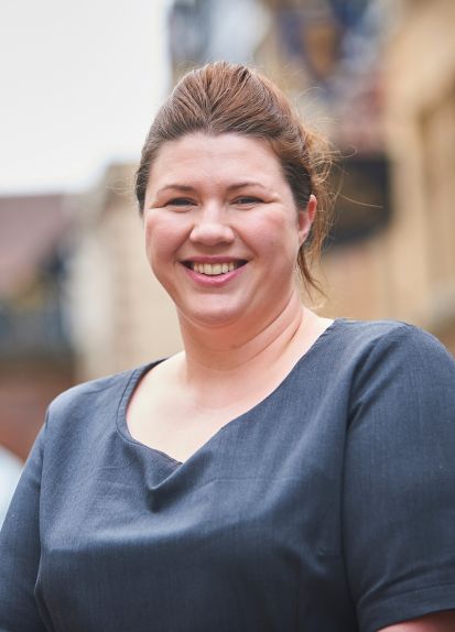 Smiling woman standing