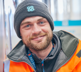 Warehouse operative smiling