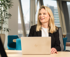 Smiling woman in office