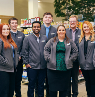 Smiling retail worker group