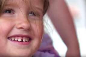 Young girl's smiling face