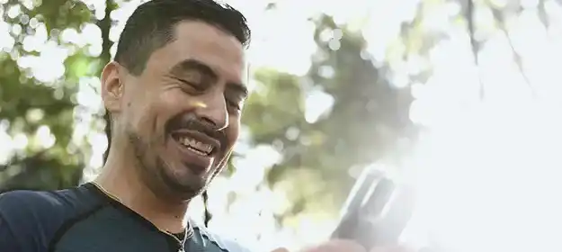 A man looking at his phone