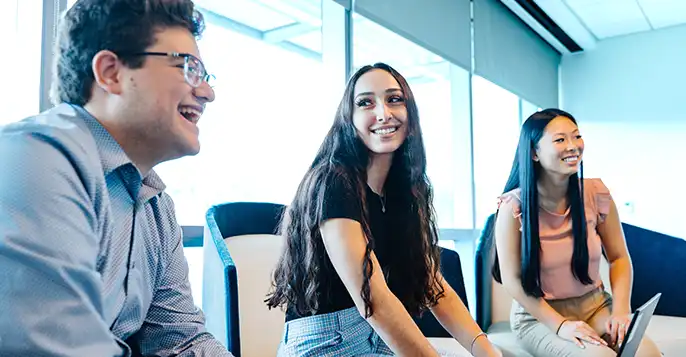 Group of young professionals in an office setting