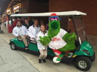Philly colleagues jump at the chance to combine baseball fun with customer engagement.