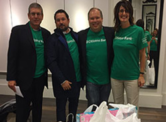 Executive Leadership Group (ELG) joining forces to shop for local families in need.
