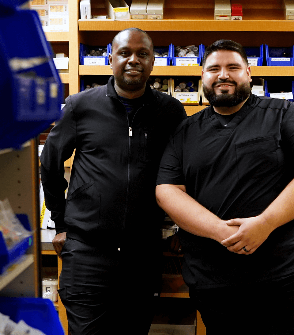 Two people smiling for the camera