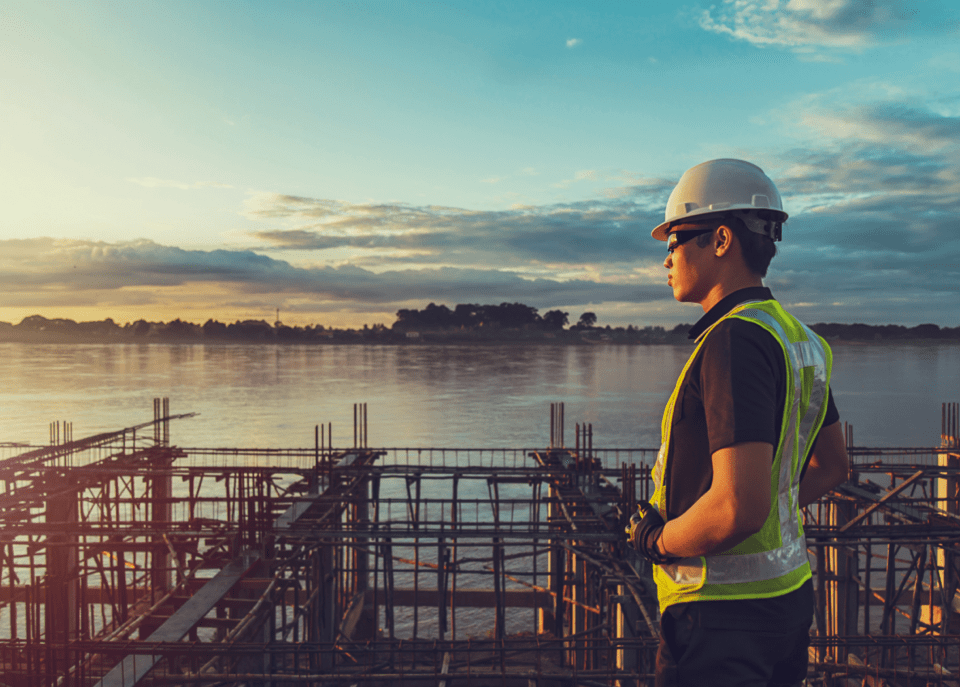 worker overlooking bay