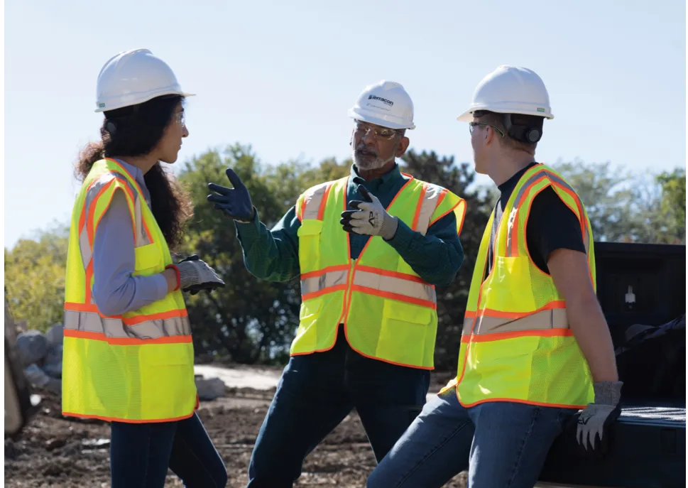 Workers discussing