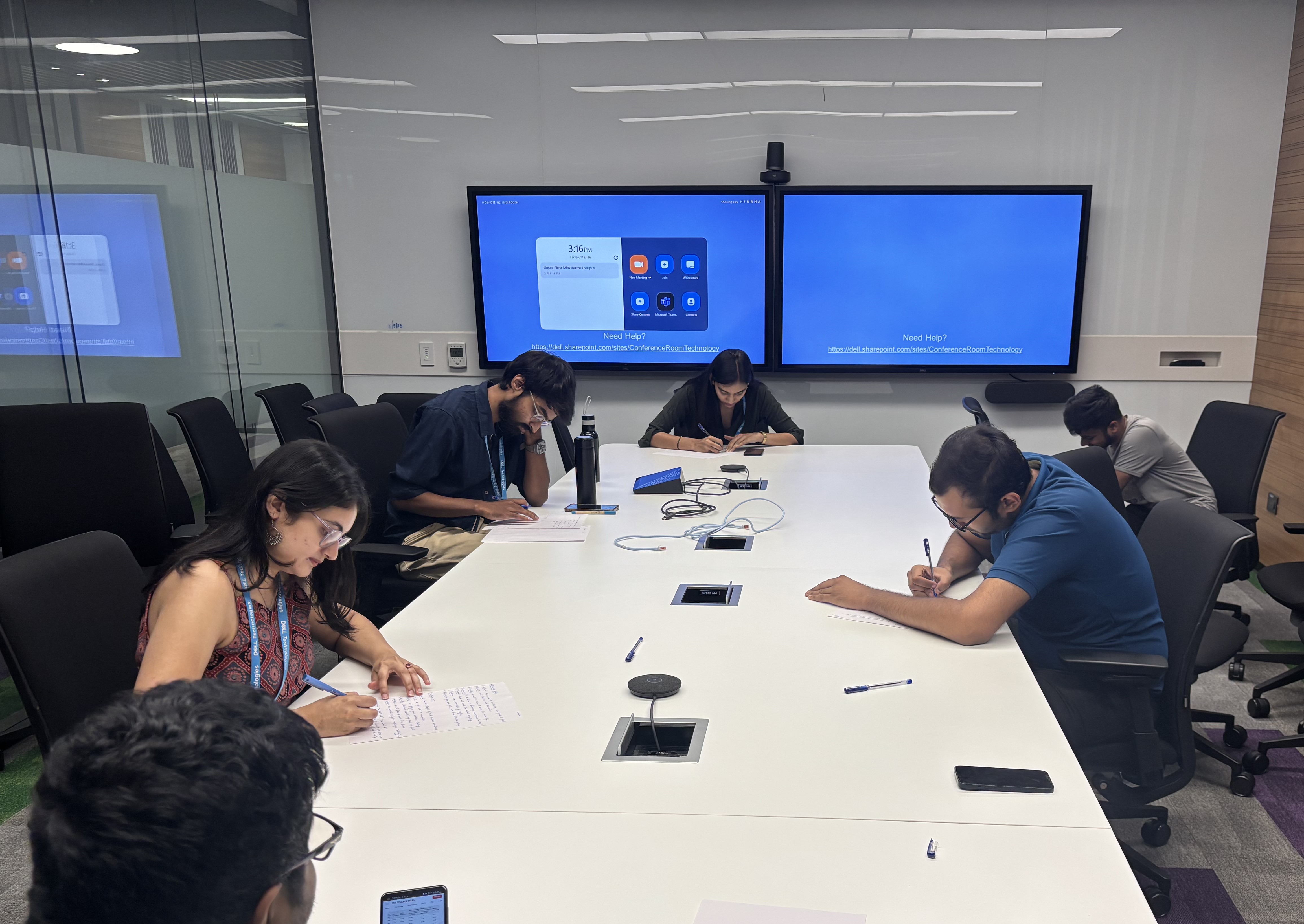 Niharika and other interns at work in office