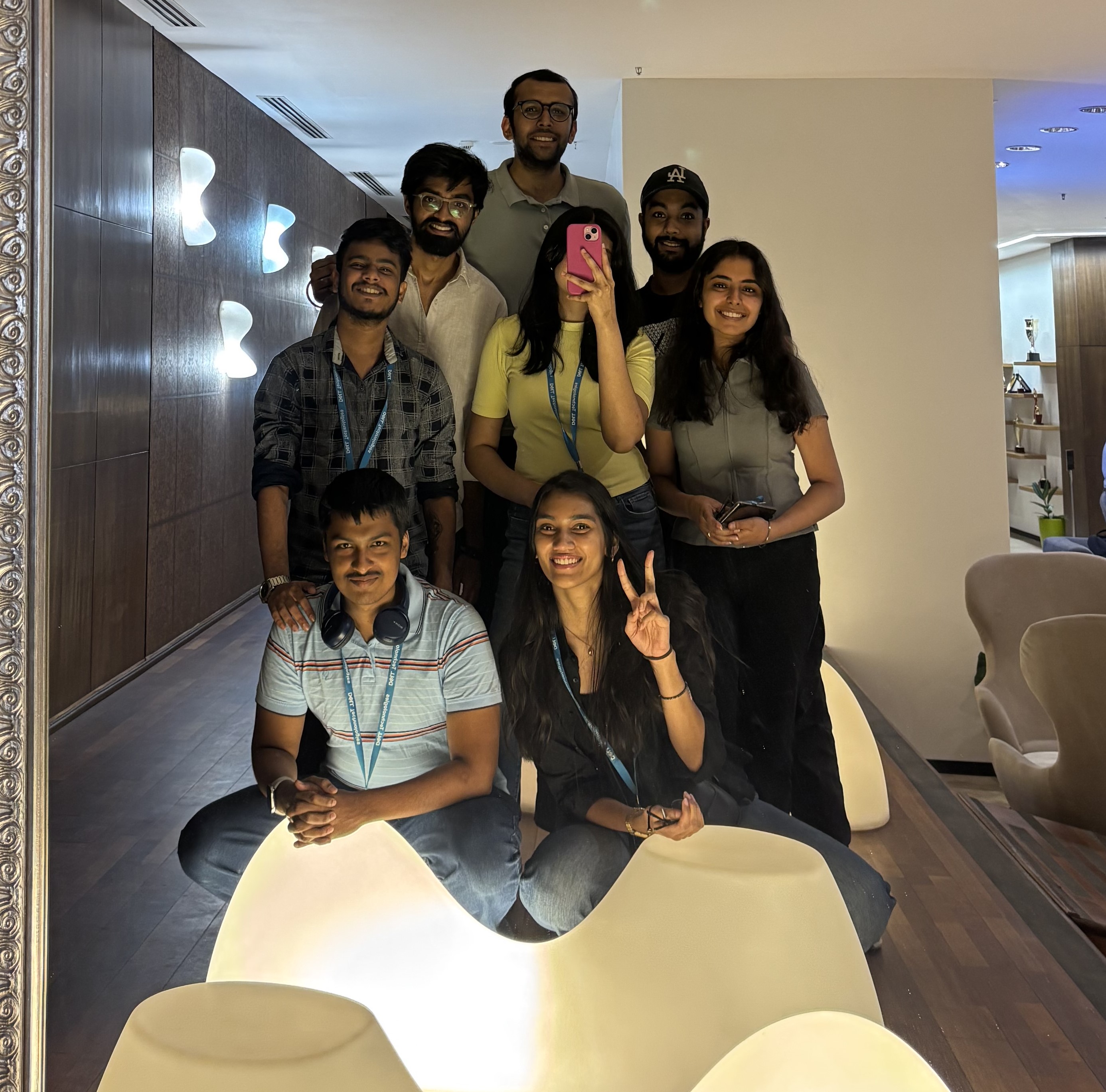 Niharika with other interns taking a mirror selfie