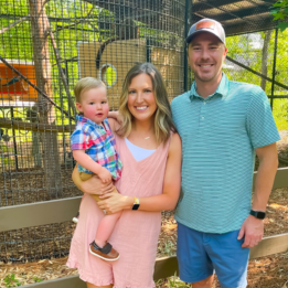 Liz smiles with her husband and son at the Duke Lemur Center.