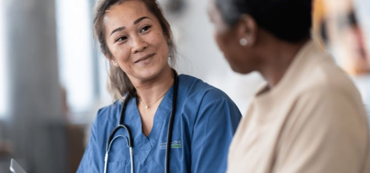 nurse talking to patient
