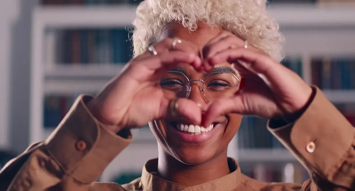 Woman making a heart with her hands