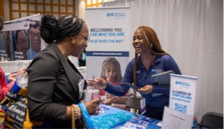 two women at a networking event