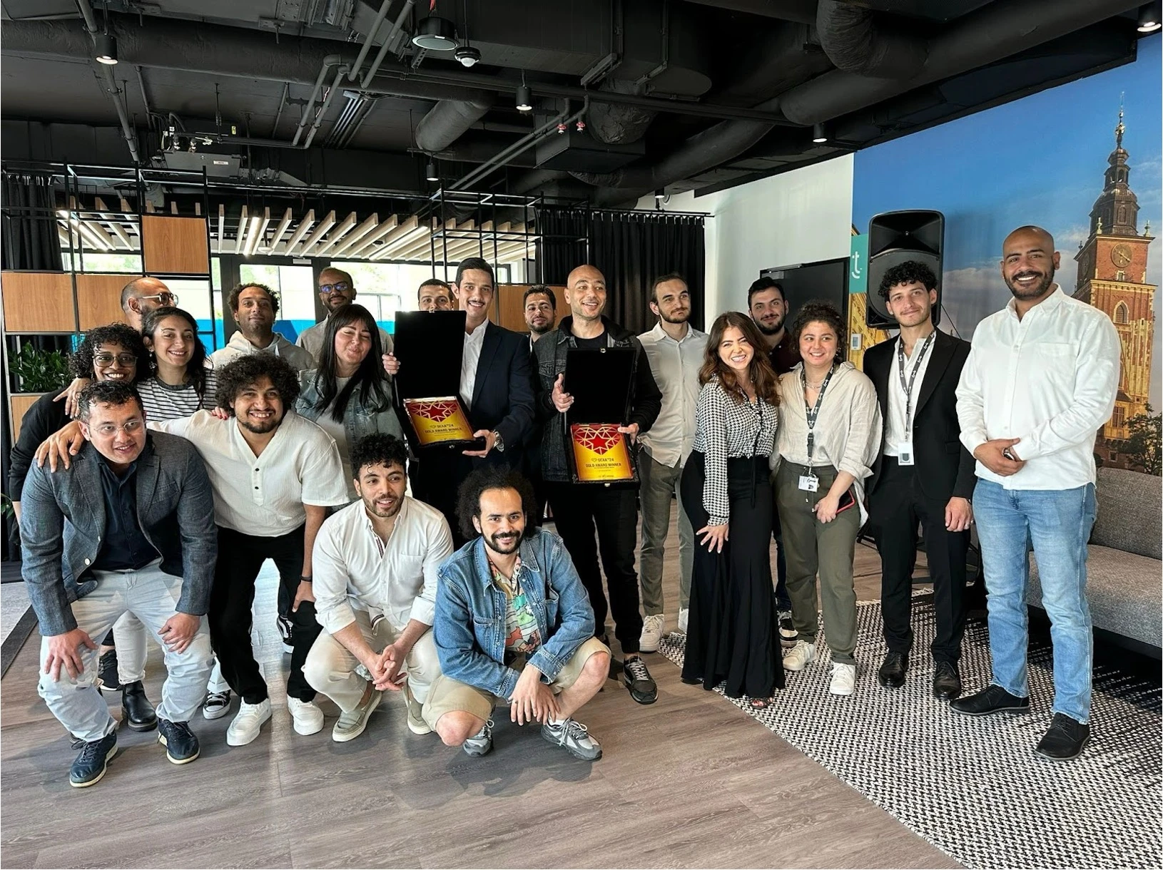 A group of employees at their office.