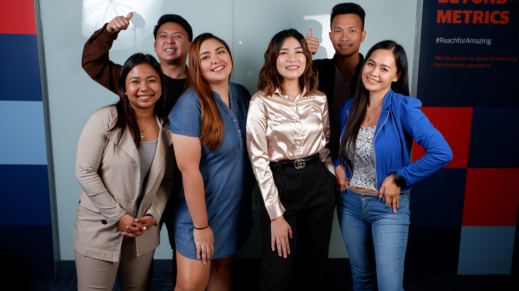 A happy team at TTEC