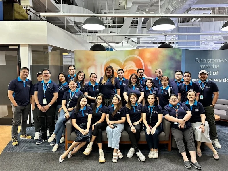TTEC Team members wearing company shirts.