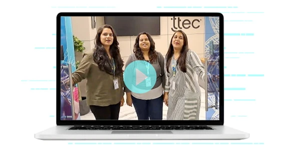 A laptop with a video thumbnail of three women