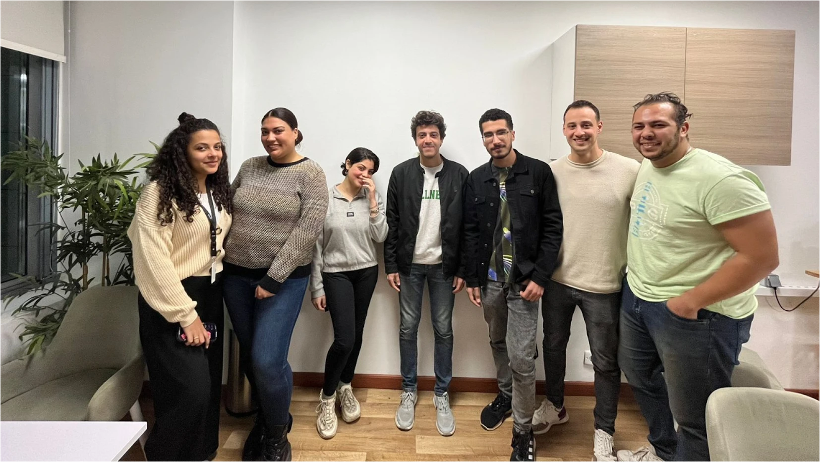 A group of employees in an office setting