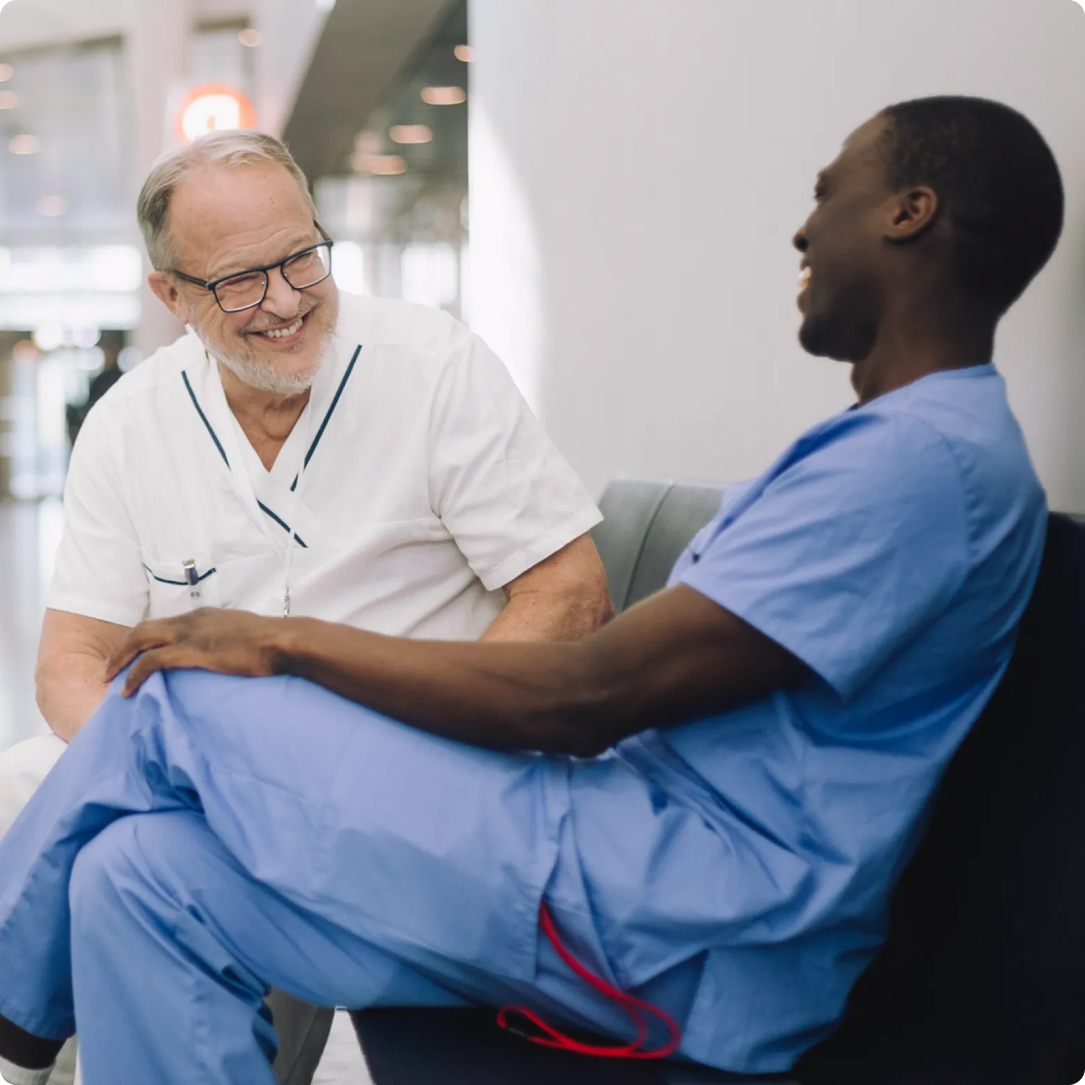 two nurses speaking together