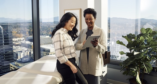 Two medical professionals in an office