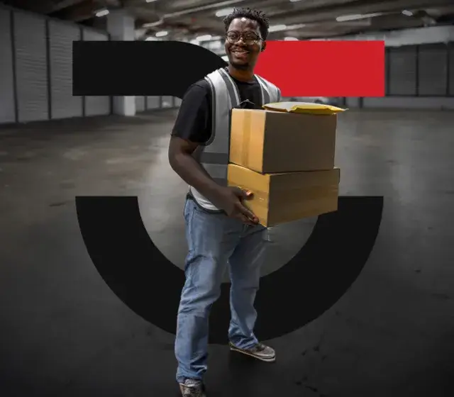 Ontrac employee holding boxes