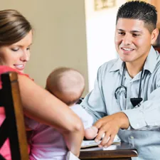 Doctor checking on baby