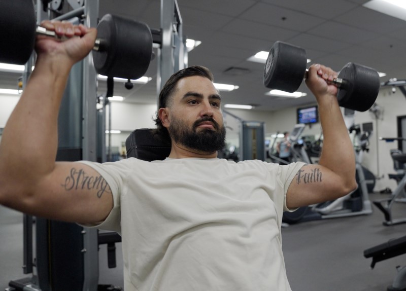 Employee weightlifting in the New Mexico site gym