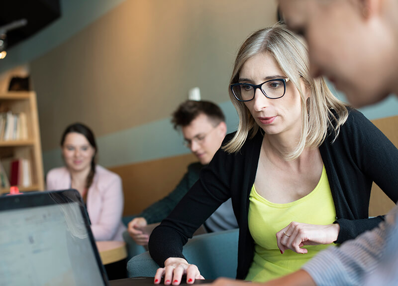 Employees working on laptop