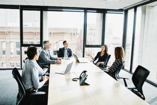 Colleagues talking in a meeting