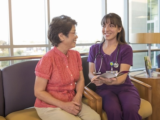 Nurse talking to a patient