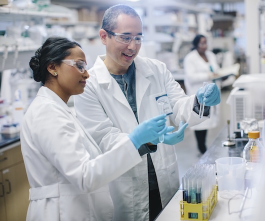 Two people working together in a lab