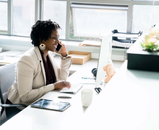 Pharmacy Manager at her desk