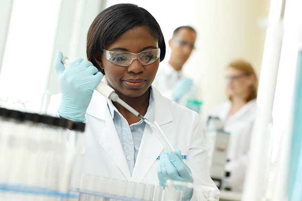 Laboratory worker with lab equipment