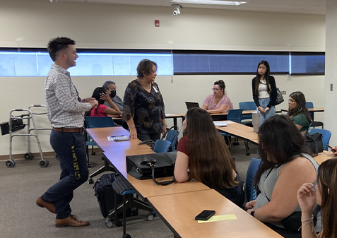 Alex Walker presents to student interns