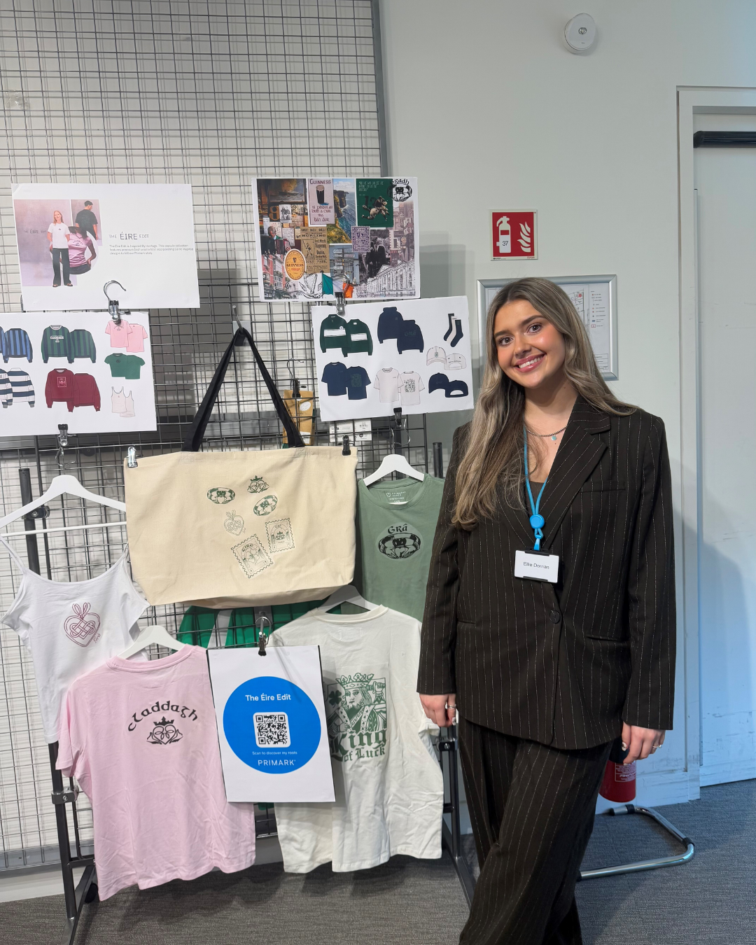 Colleague standing in front of project work they are going to present
