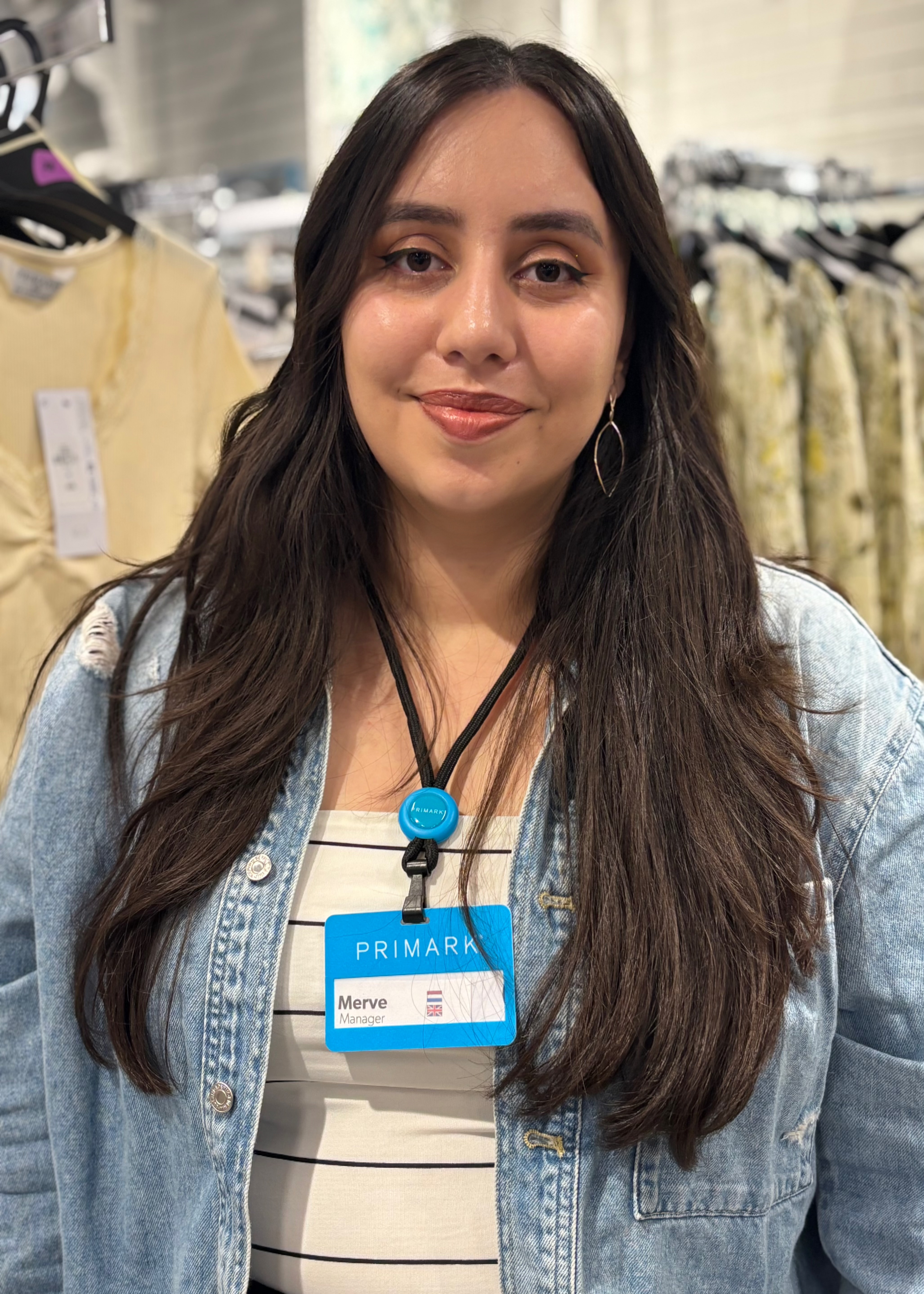 Colleague smiling in store