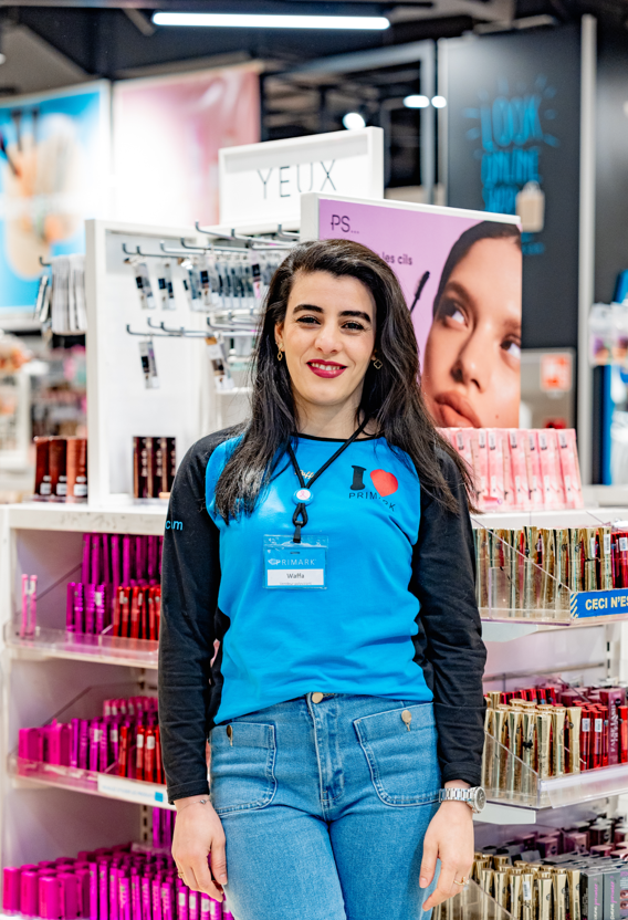 Colleague smiling in store