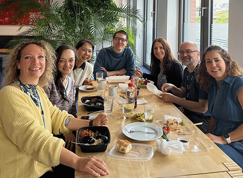 Diana with colleagues at a team meeting with Parexel CEO, and a team lunch in Berlin.