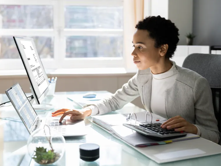 Woman working at a computer