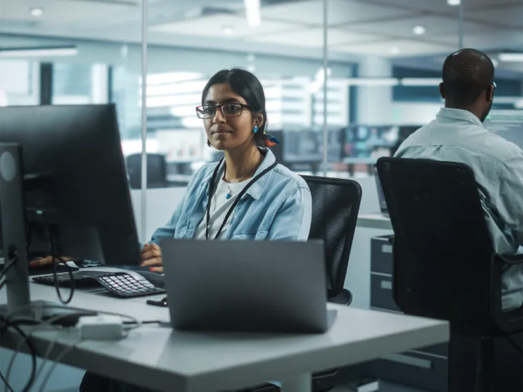 Woman working at a computer